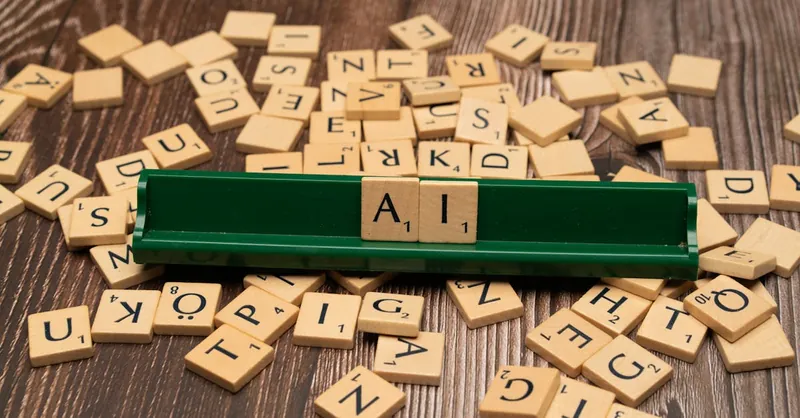 Wooden letter tiles spelling AI, representing technology and innovation.