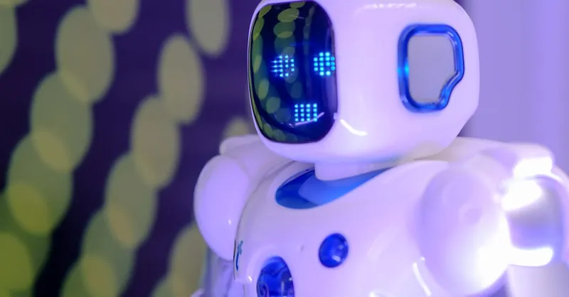 Modern toy robot with LED facial display, showcasing advanced technology and innovation.